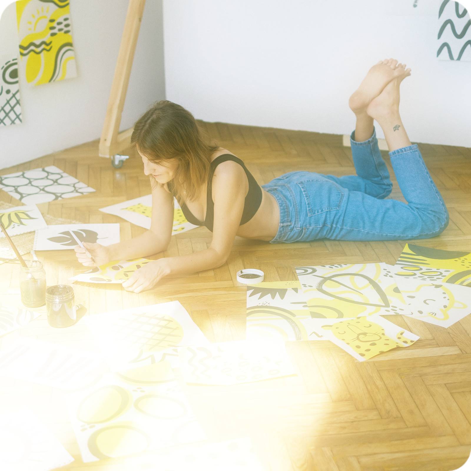 woman painting on floor